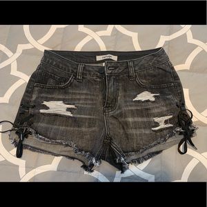 Black distressed shorts